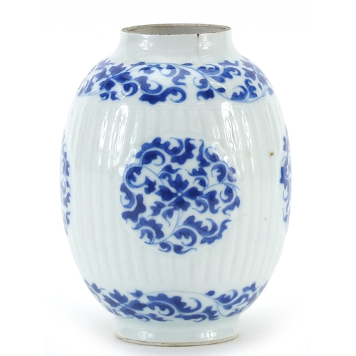 37 - Chinese blue and white porcelain ribbed vase hand painted with flowers and scrolling foliage, Kangxi... 