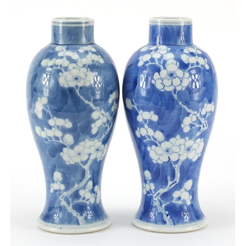 129 - Pair of Chinese blue and white porcelain baluster vases hand painted with prunus flowers, four figur... 