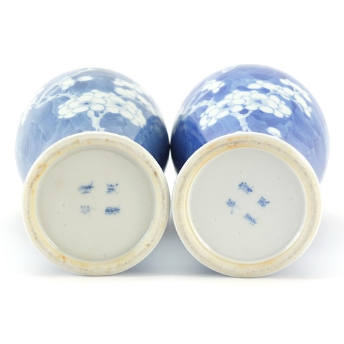 129 - Pair of Chinese blue and white porcelain baluster vases hand painted with prunus flowers, four figur... 