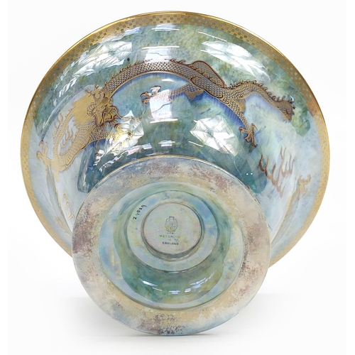 86 - Wedgwood Fairyland lustre footed bowl hand painted with dragons, inscribed Z4829 to the base, 22cm i... 