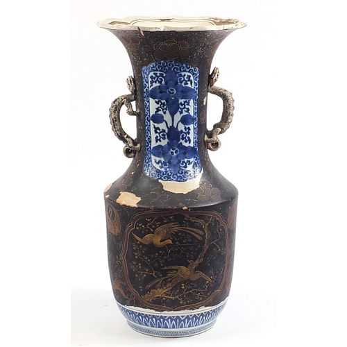135 - Large Japanese lacquered porcelain vase with dragon handles, gilded with birds of paradise amongst f... 