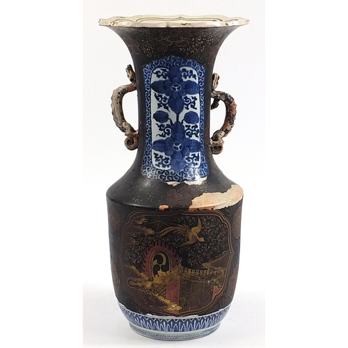135 - Large Japanese lacquered porcelain vase with dragon handles, gilded with birds of paradise amongst f... 