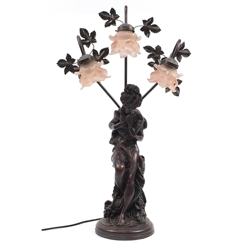 2214 - Large bronzed figural table lamp with three pink frilled glass shades, 80cm high