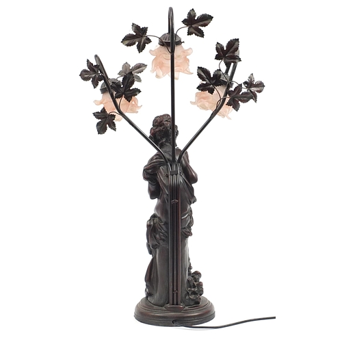 2214 - Large bronzed figural table lamp with three pink frilled glass shades, 80cm high