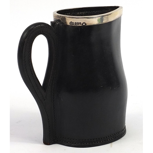 21 - Early 20th century leather Black Jack jug with silver rim, impressed Ross Winchester to the base, 19... 