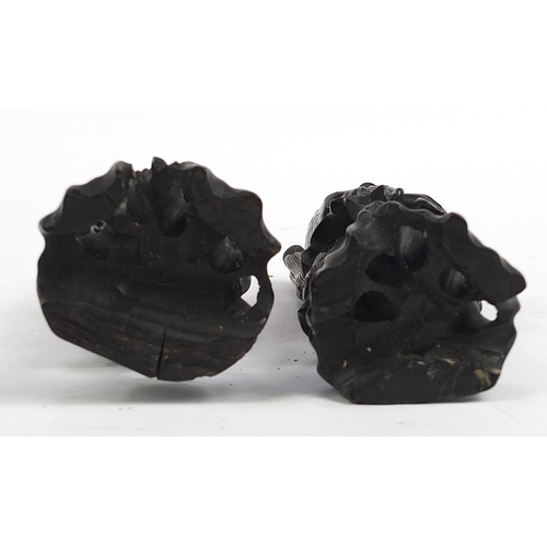 85 - Pair of Chinese carved root wood figures with white metal inlay, 20.5cm high