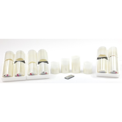 2175 - Four sets of as new LED colour changing candles, the largest 15cm high