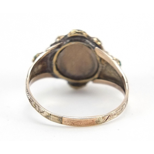 861 - Antique unmarked gold opal green stone and black enamel mourning ring with engraved shoulders, size ... 