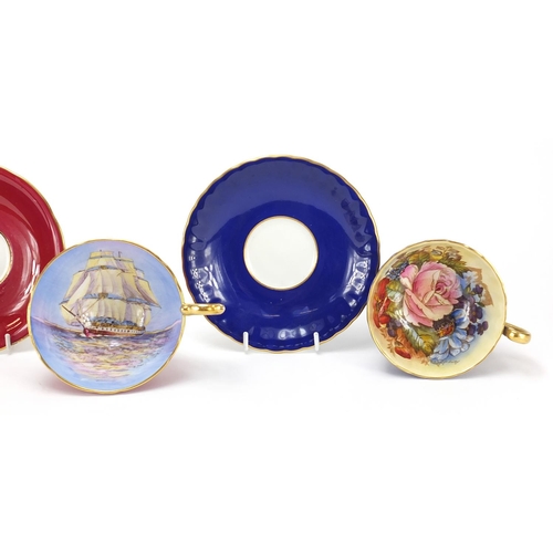 90 - Three Aynsley cups and saucers including two hand painted with flowers and one decorated with a rigg... 