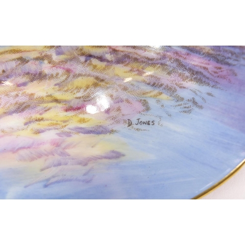 90 - Three Aynsley cups and saucers including two hand painted with flowers and one decorated with a rigg... 