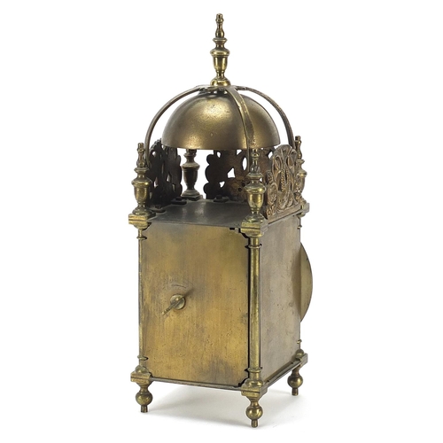117 - 18th century style brass lantern clock with silvered chapter ring having Roman numerals retailed by ... 