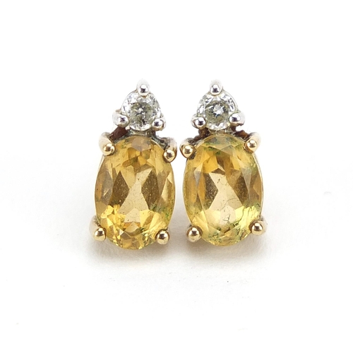 882 - Pair of 9ct gold diamond and citrine stud earrings, 10mm high, 1.7g