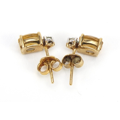 882 - Pair of 9ct gold diamond and citrine stud earrings, 10mm high, 1.7g