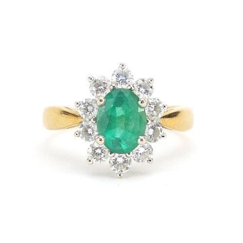 876 - 18ct gold emerald and diamond ring, the diamonds approximately 3mm in diameter, size L, 4.6g