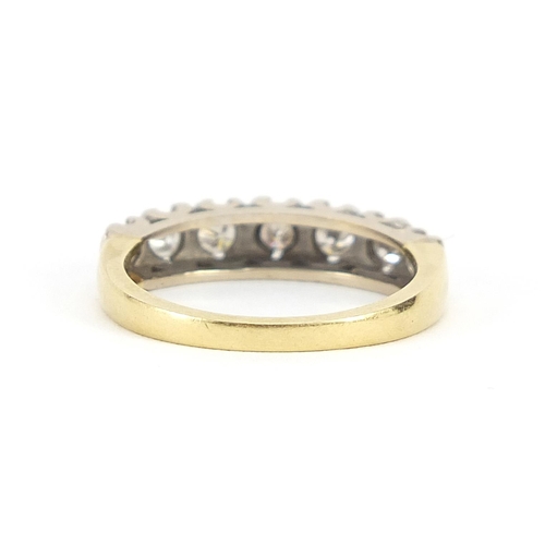 869 - 18ct gold diamond half eternity ring, size K, 3.6g