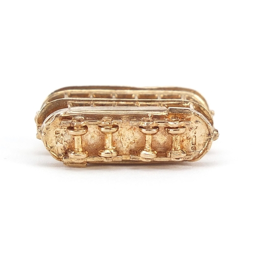 856 - 9ct gold tram charm, 2.5cm wide, 6.9g