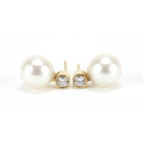 859 - Pair of 18ct gold pearl and diamond stud earrings, 1.3cm high, 3.4g