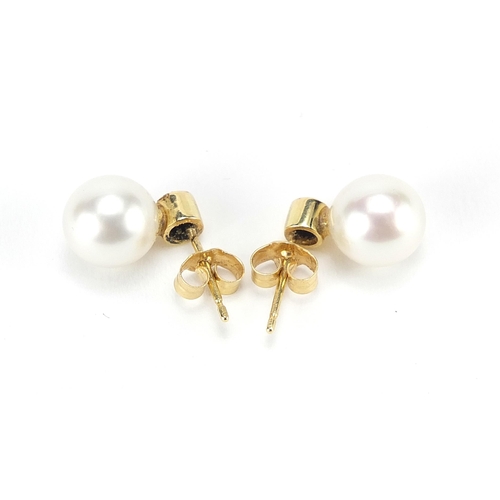 859 - Pair of 18ct gold pearl and diamond stud earrings, 1.3cm high, 3.4g