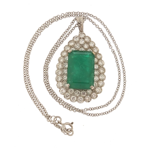 857 - 18ct white gold diamond and emerald pendant on an 18ct white gold necklace, each diamond approximate... 