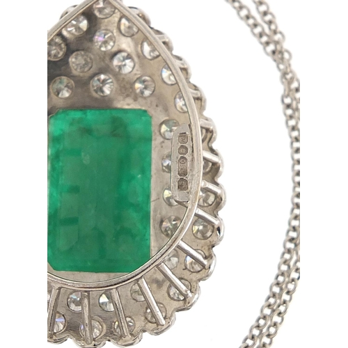 857 - 18ct white gold diamond and emerald pendant on an 18ct white gold necklace, each diamond approximate... 