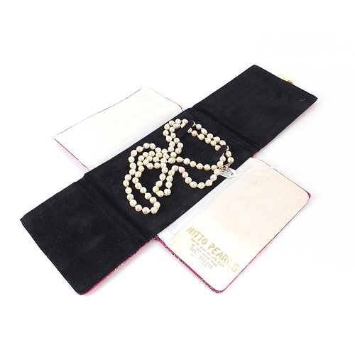 2191 - Nitto pearl necklace with silver clasp and embroidered case, 90cm in length, 51.0g