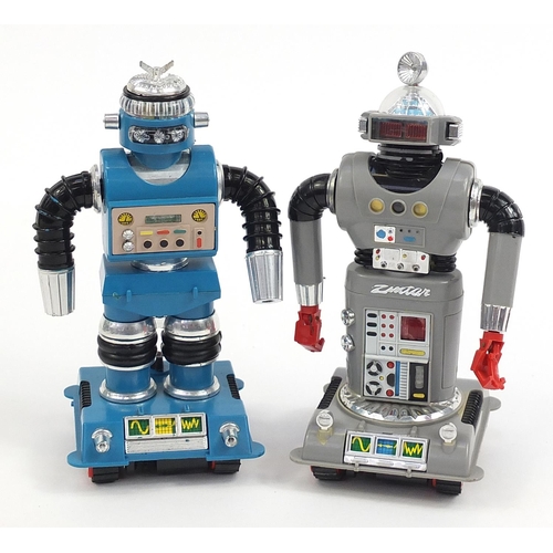 305 - Two vintage Zeroids robots with cases, the largest box 21.5cm high