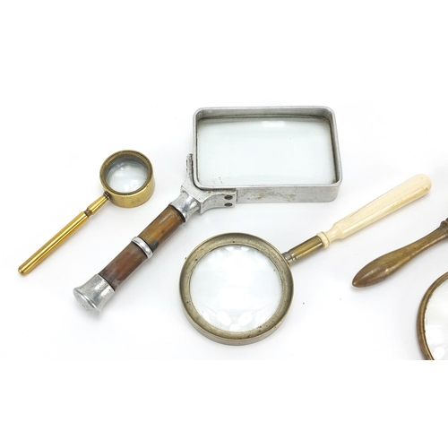 2193 - Five antique and later magnifying glasses including one with bone handle and one impressed Yulo, the... 