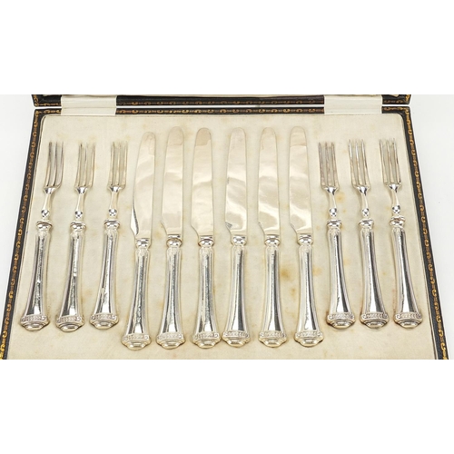 840 - John Sanderson, set of six silver handled knives and forks with steel blades housed in a Weir & Sons... 