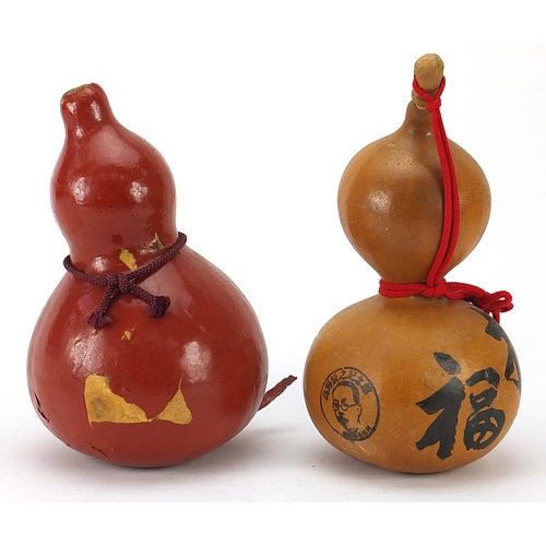 141 - Two Japanese sake gourds including a lacquered example, the largest 28cm high