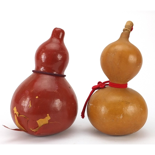 141 - Two Japanese sake gourds including a lacquered example, the largest 28cm high