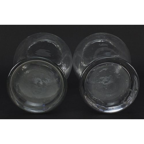 152 - Pair of 19th century apothecary baluster glass vases, each 32.5cm high