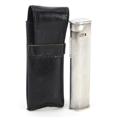 847 - Dunhill silver plated pocket lighter with engine turned decoration and leather case, 7.5cm high