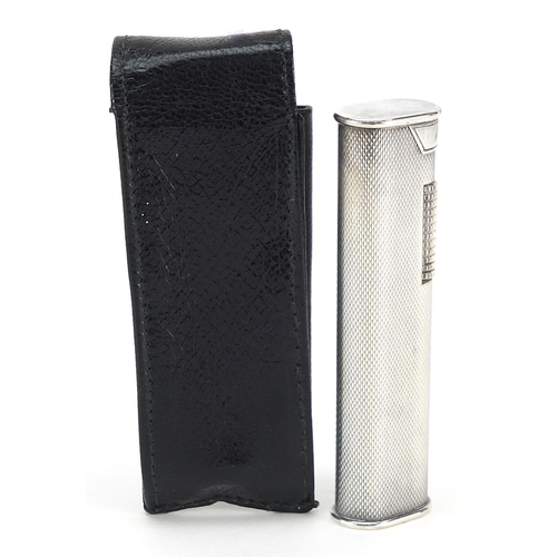 847 - Dunhill silver plated pocket lighter with engine turned decoration and leather case, 7.5cm high