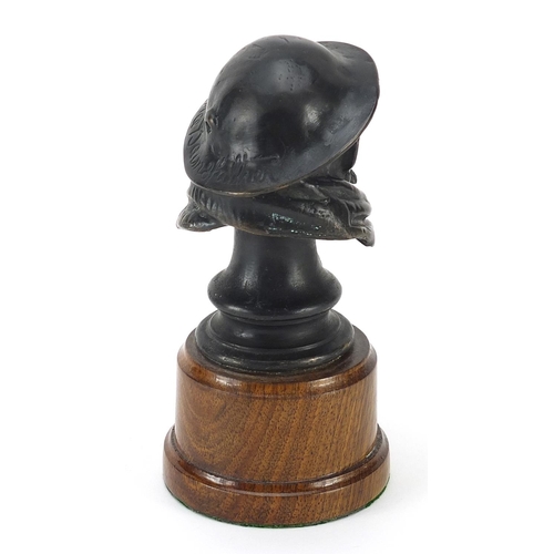 103 - Motoring interest patinated bronze Bruce Bairnsfather Old Bill car mascot raised on later turned woo... 