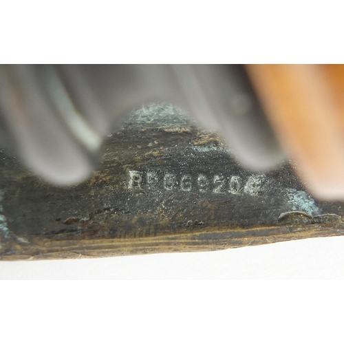 103 - Motoring interest patinated bronze Bruce Bairnsfather Old Bill car mascot raised on later turned woo... 