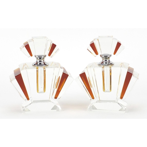 168 - Pair of Art Deco style amber coloured and clear glass scent bottles, 12cm high
