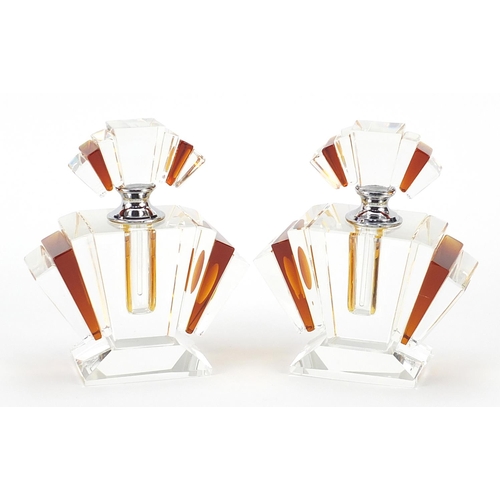168 - Pair of Art Deco style amber coloured and clear glass scent bottles, 12cm high