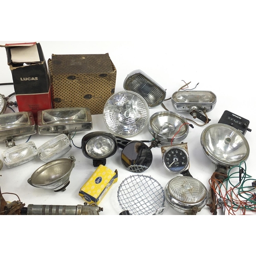 115 - Large collection of vintage motoring interest vehicle parts including Lucas lamps and Marchal headli... 