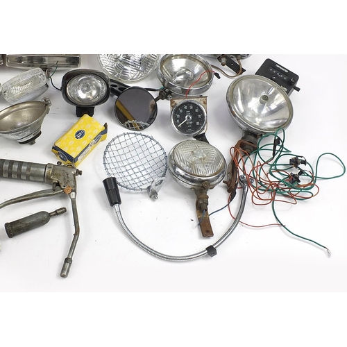 115 - Large collection of vintage motoring interest vehicle parts including Lucas lamps and Marchal headli... 