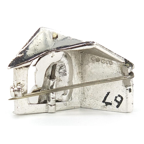 107 - Rare motoring interest silver and enamel lapel badge relating to The Women's Motor Racing Associates... 