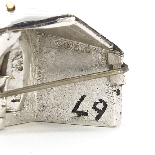 107 - Rare motoring interest silver and enamel lapel badge relating to The Women's Motor Racing Associates... 