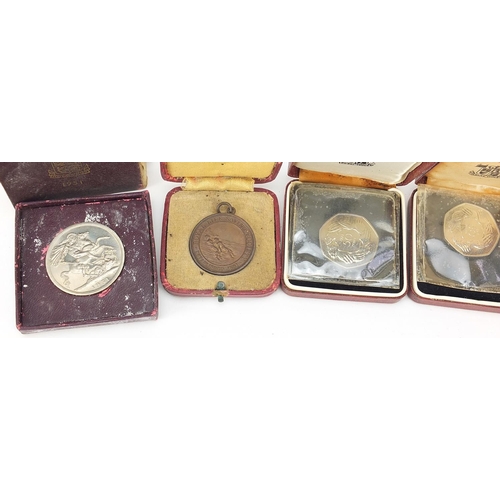 2188 - Royal Life Saving Society medallion, Festival of Britain crown and four fifty pence pieces