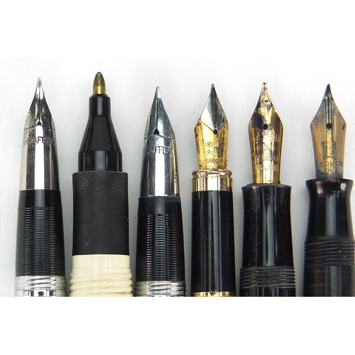 66 - Five vintage fountain pens including Burnham, Parker Vacumatic and Sheaffer