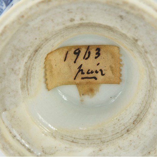 125 - Matched pair of Chinese blue and white porcelain vases and covers hand painted with panels of flower... 