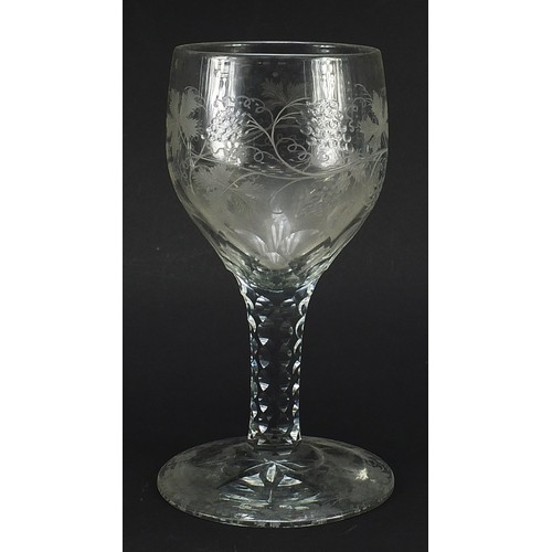 6 - Large 18th century glass goblet with facetted stem etched with leaves and berries, 25cm high