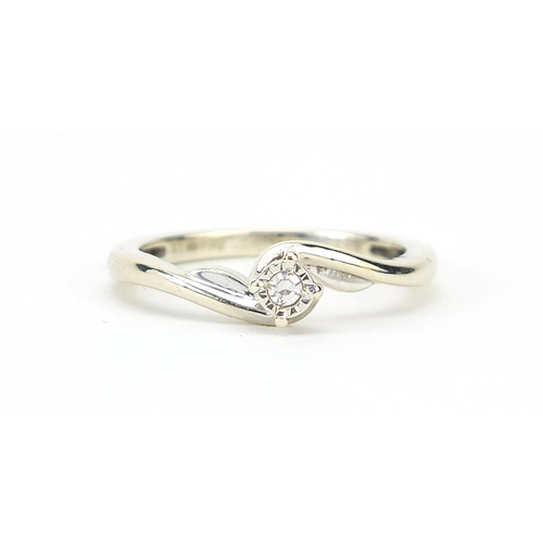 871 - 9ct white gold diamond solitaire crossover ring, size L, 2.4g