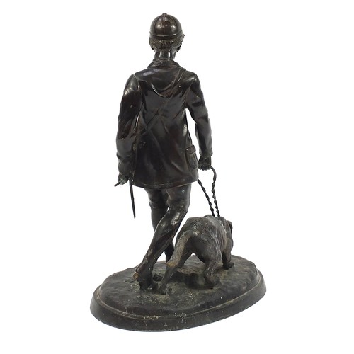 17 - Large patinated bronze study of a huntsman and hound, 61.5cm high