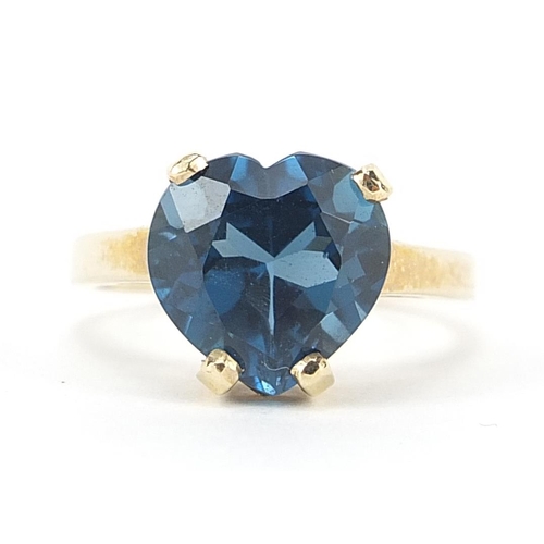 185 - 9ct gold blue topaz love heart ring, size R, 5.4g