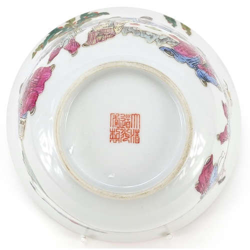 973 - Chinese porcelain bowl hand painted in the famille rose palette with figures in a palace setting, si... 