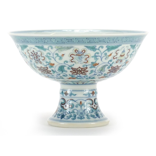 924 - Chinese doucai porcelain stem bowl hand painted with flowers and Daoist emblems, six figure characte... 